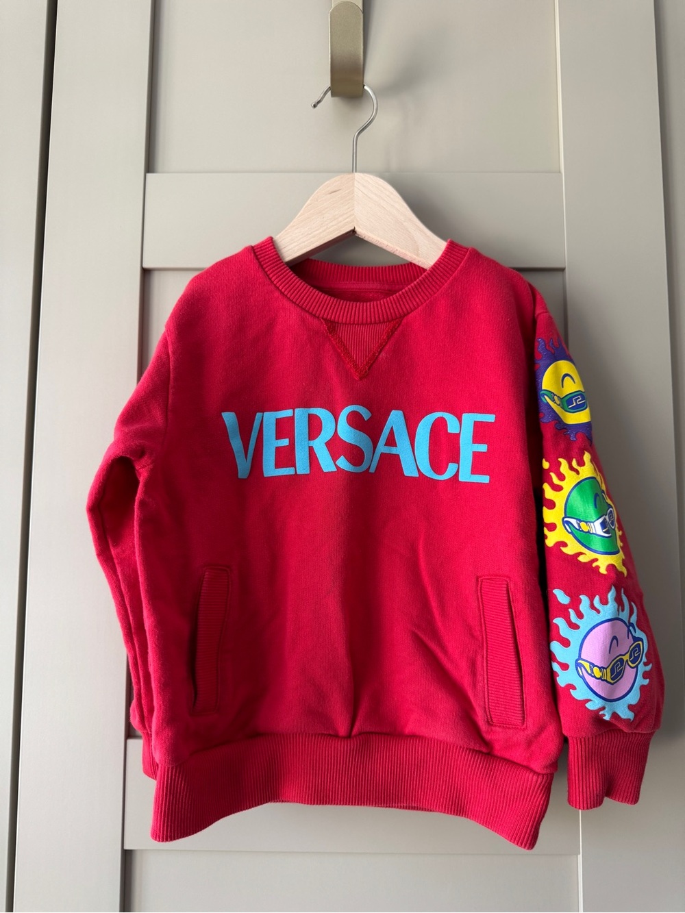 Versace Kids Red Sweatshirt with Blue Logo and Multicolor Graphic Sleeve